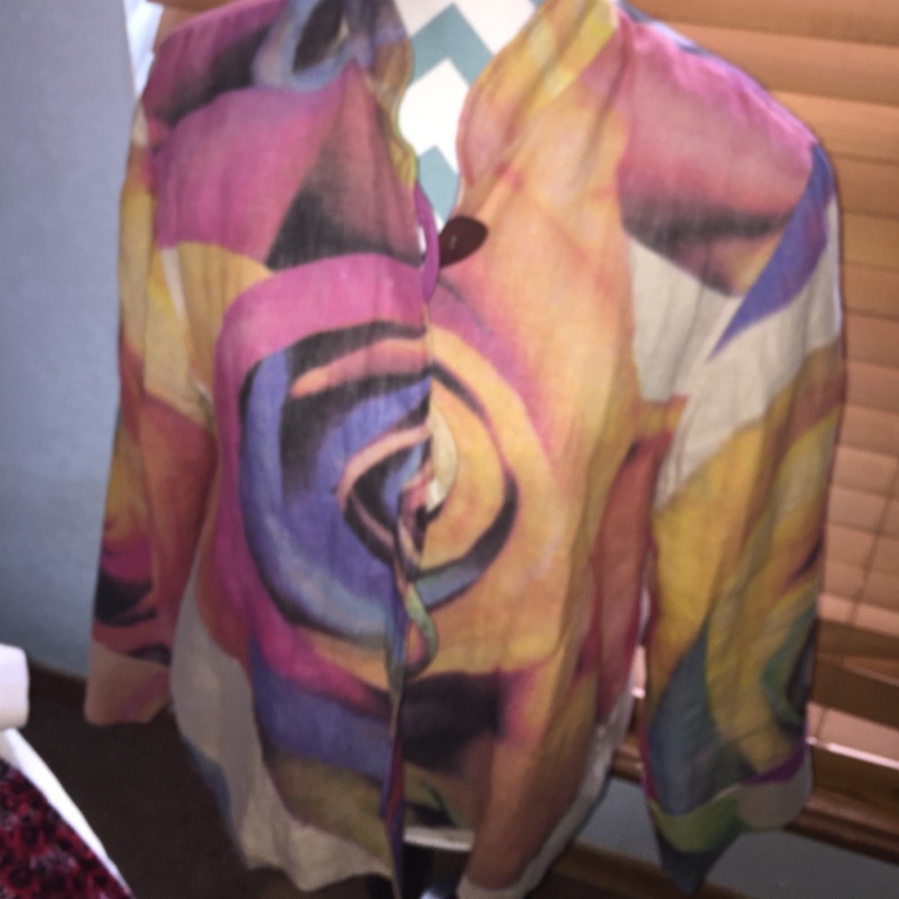 Light weight jacket. Very colorful. Waist length.